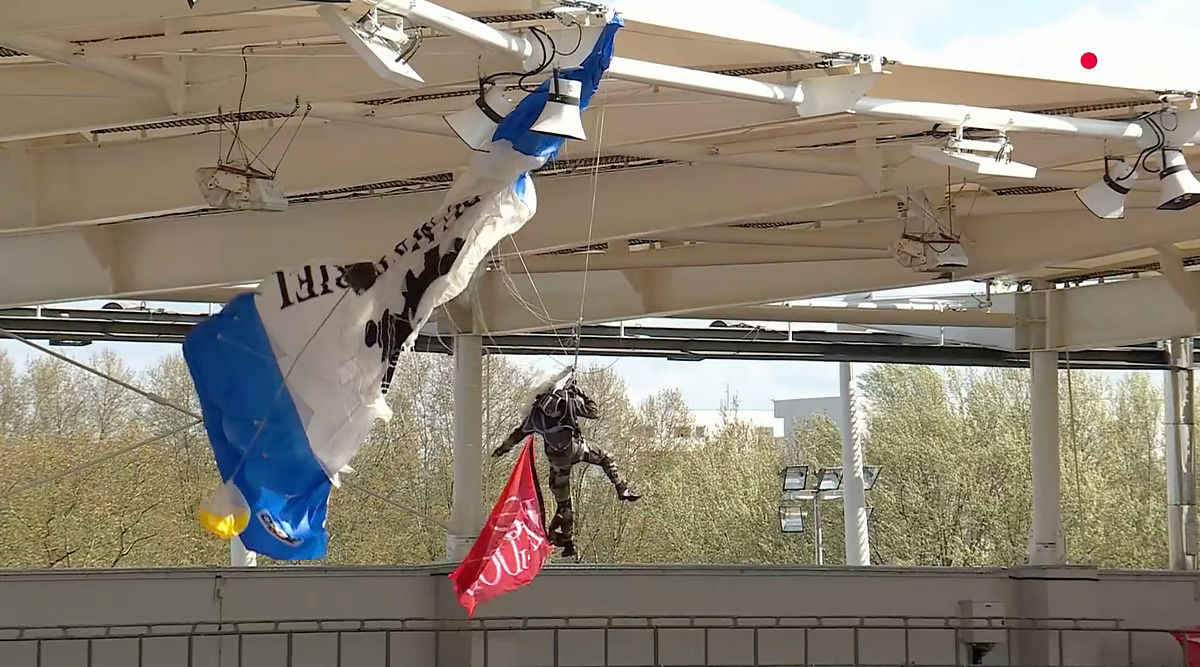 WATCH: Rugby fans hold their breath as parachutist rescued after roof crash in France
