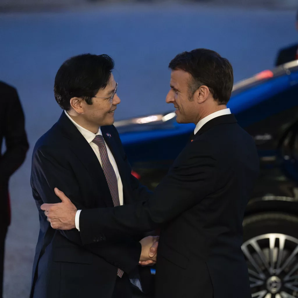 Singapore Prime Minister and Finance Minister Lawrence Wong with French President Emmanuel Macron