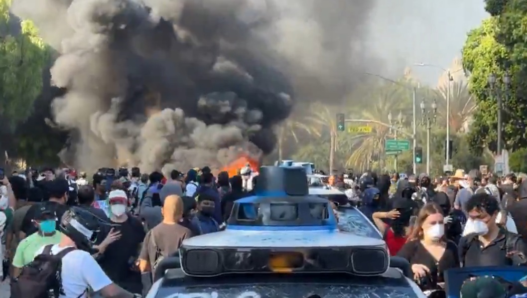  Law enforcement officials and protesters clashed in Los Angeles, with tension mounting in the city