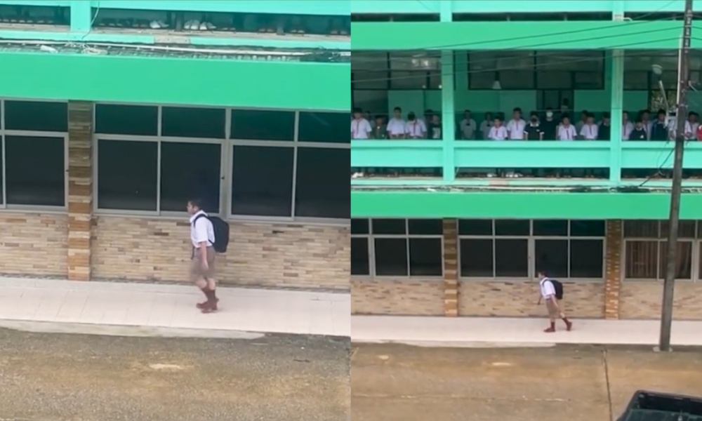 Balancing act goes VIRAL as Thai student halts mid-walk for national anthem; WATCH